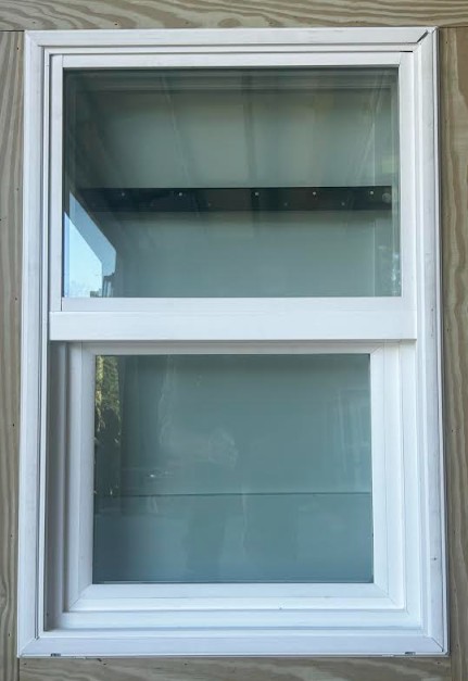 Storm Jamb window before hurricane        fabric installed